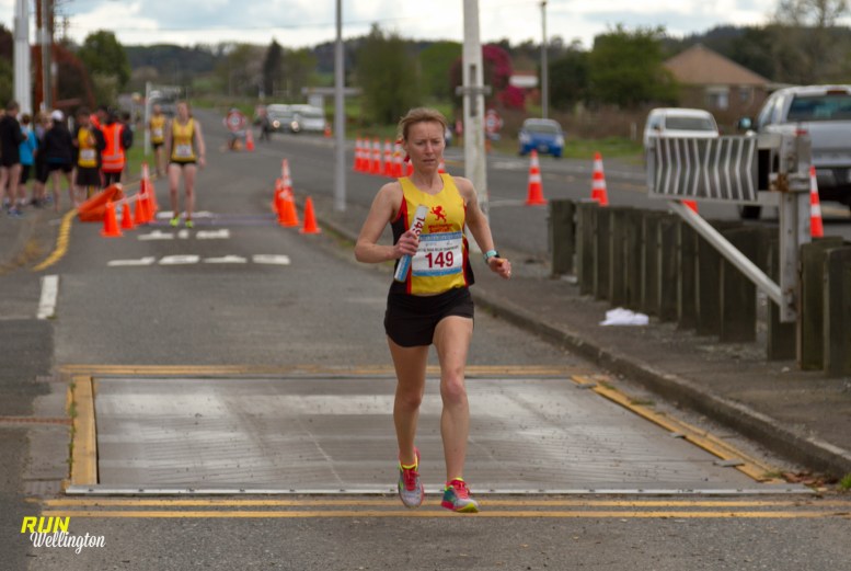 Wellington Scottish Senior Women's Captain Lindsay on her way to finish the last lap