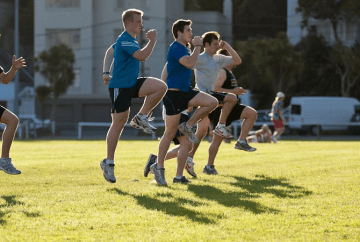 A group performing running form drills